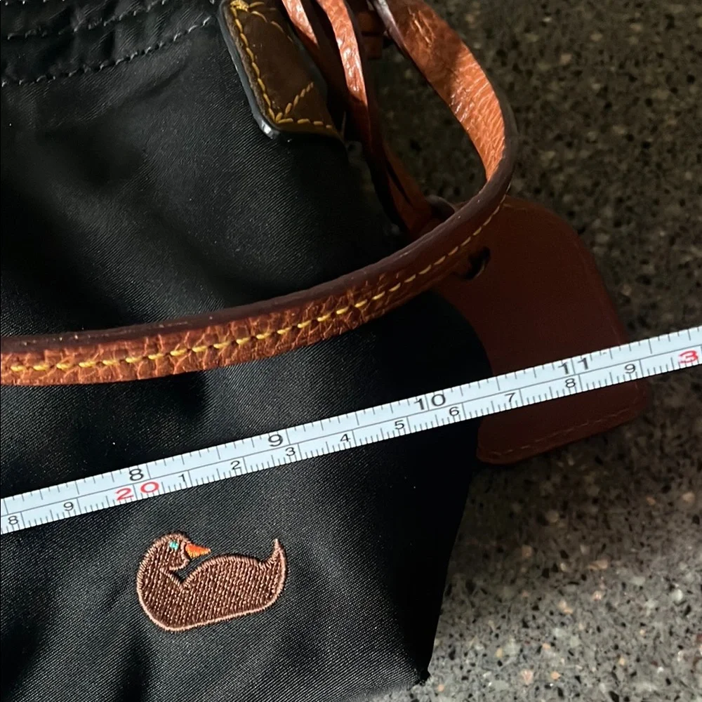 Dooney & Bourke Black Handbag with Brown Leather Strap and Hot Pink Interior - Picture 16 of 16